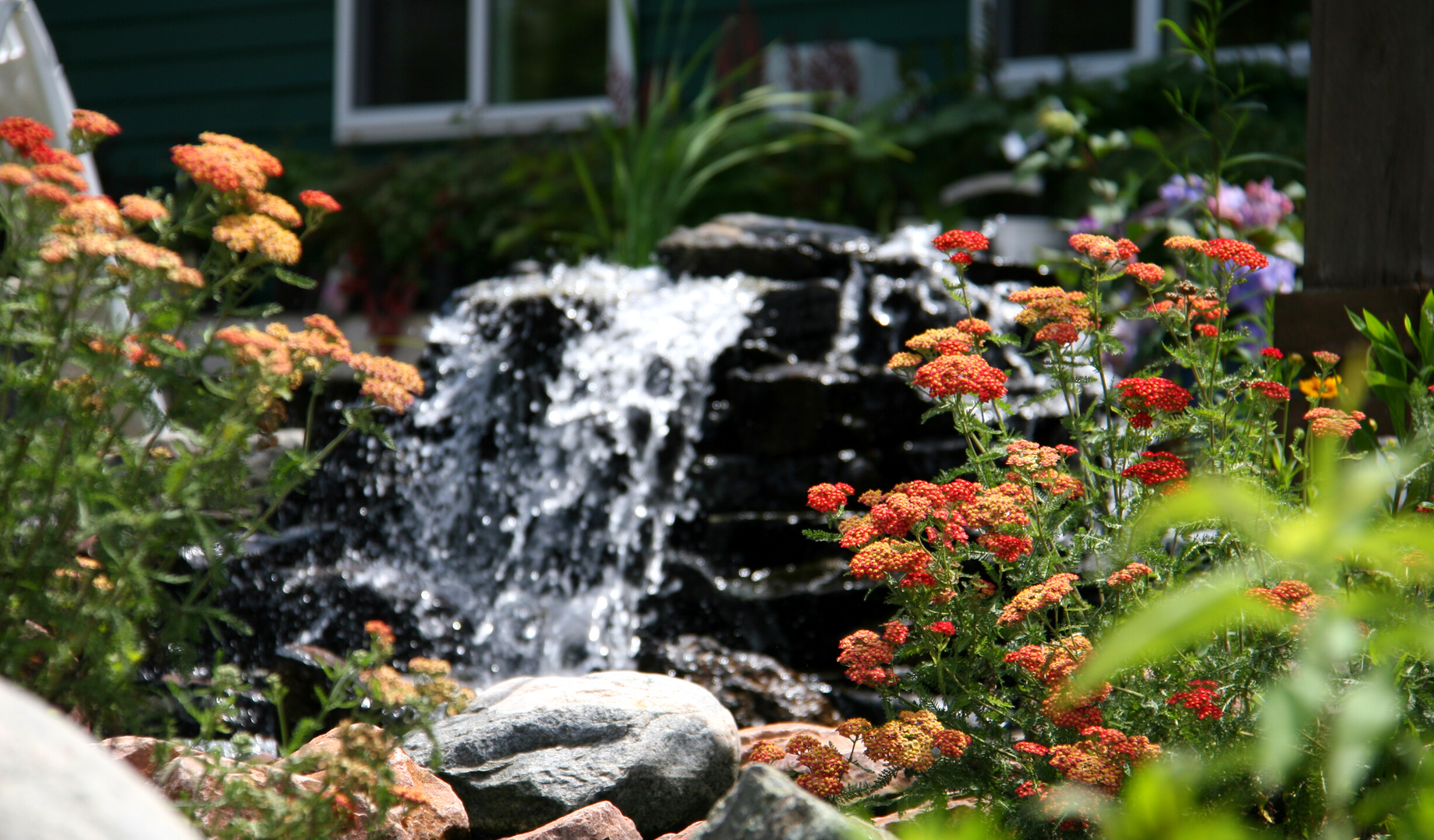 landscape design, water feature, woodbury mn landscaping, patio, spring project